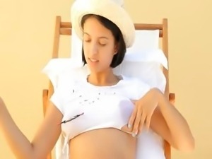Busty woman torturing her nipples