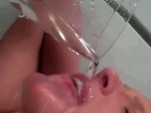 Busty blonde drinks her own piss