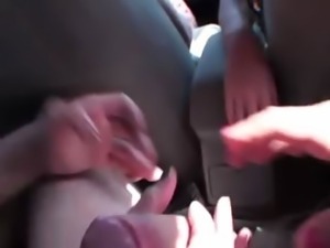 Two brunette girls sucking cock in car