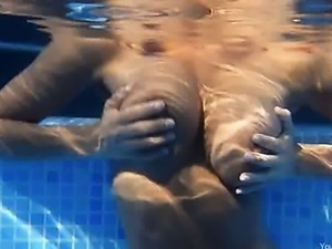 Underwater strip of sweet boobs