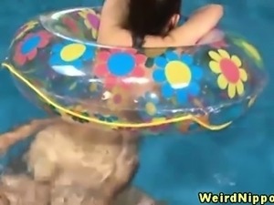 Young nippon in bikini getting fucked at the pool