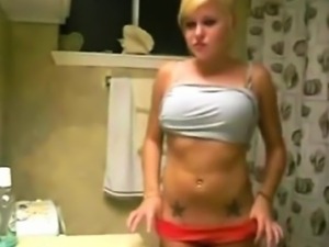 Tattooed Blonde Teen Films Herself Teasing In Bathroom