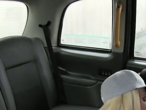 Tattooed British blonde with huge tis fucking in fake taxi