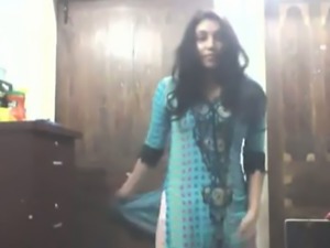 Cute long haired Indian gal shows off in her bright saris