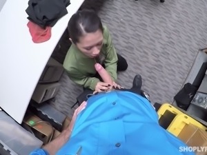 Lovely looking Asian chick sucks horny security man off in the storage place