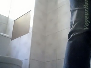 Chunky white milf in the toilet room pissing on hidden cam