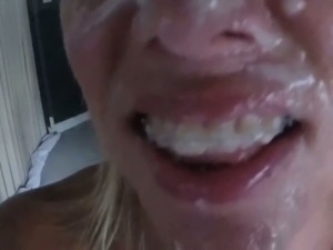 Filthy blonde whore gets her face covered in jizz in amateur video