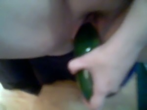 Using a big cucumber kinky pallid lady was teasing her own pussy