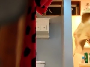 Shower voyeur spies on a hot amateur brunette with big boobs