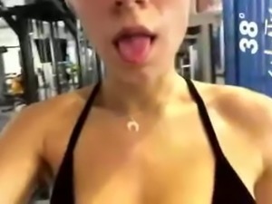 beautiful sweaty girl showing off her sweat