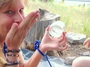 Amazing milf drinks a glass of cum