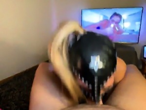 Masked blonde slave takes a POV cock deep down her throat 