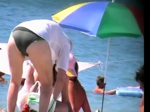 Naked Blonde Sunbathing On A Public Beach