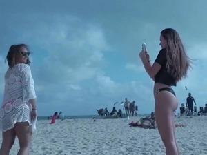 Big ass teen on the beach voyeur