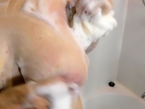 Stacked webcam milf gives a sensual blowjob in the shower