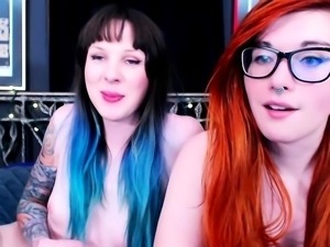 Gothic redhead lesbian licks her brunette friends pussy