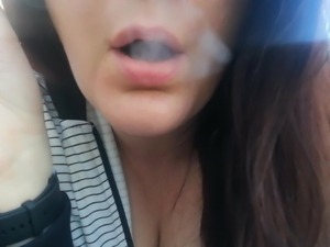Breasty Bridgette smokes