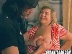 Granny with gigantic tits makes young guys cum too soon!