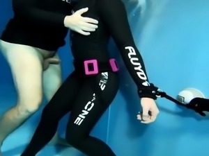 Underwater deepthroat training session for restrained slut 