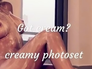 Provoking busty milf poses naked for creamy photoshoot