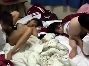 Asian schoolgirls drilled together in intense foursome
